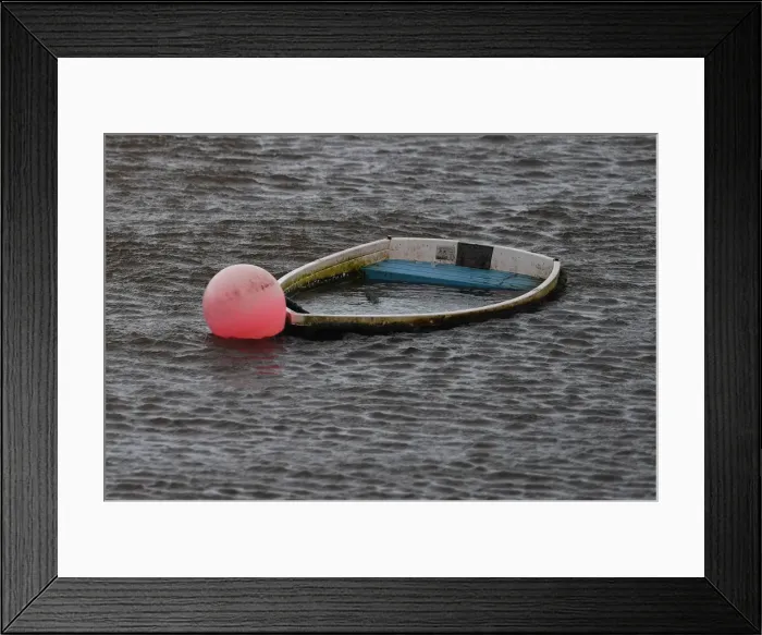 Framed Print : A sunken boat is seen half submerged after Storm Eleanor in Galway Bay