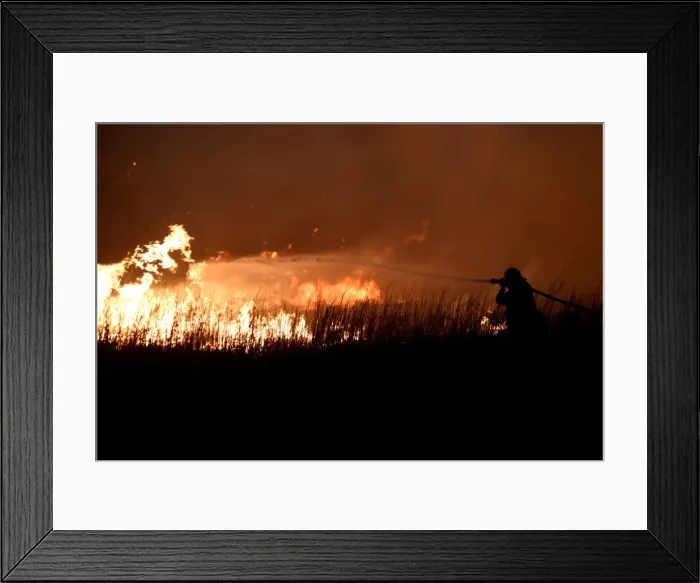 Framed Print : A firefighter works to control the Rhea fire near Seiling Framed Print : A firefighter works to control the Rhea fire near Seiling