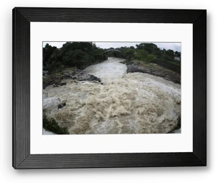 Framed Print : The Los Esclavos river, swollen by heavy rains, is seen in Cuilapa Framed Print : The Los Esclavos river, swollen by heavy rains, is seen in Cuilapa