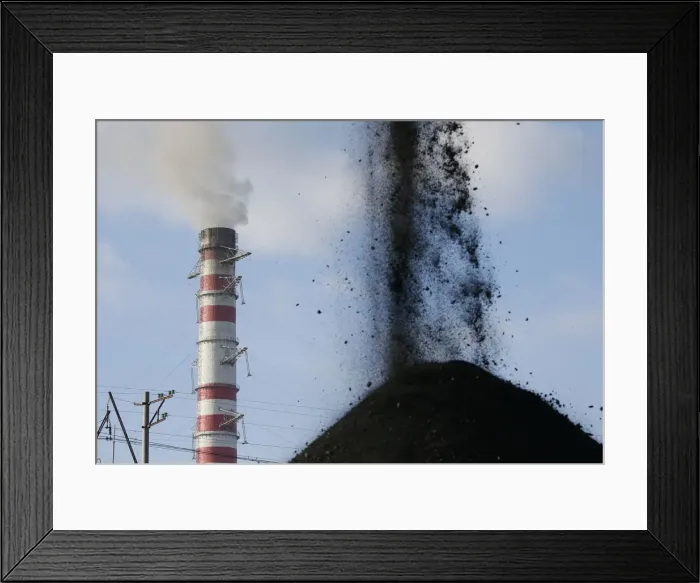 Framed Print : Coal is sorted into a pile at a warehouse of the Trypillian thermal power plant in Kiev Framed Print : Coal is sorted into a pile at a warehouse of the Trypillian thermal power plant in Kiev