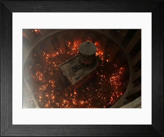 Framed Print : Worshippers hold candles as they take part in the Christian Orthodox Holy Fire ceremony Framed Print : Worshippers hold candles as they take part in the Christian Orthodox Holy Fire ceremony