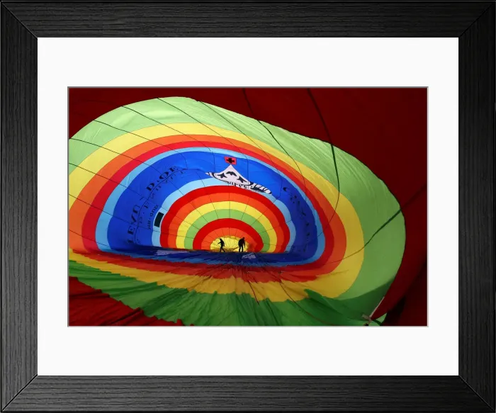 Framed Print : Participants prepare a balloon for inflation during the International Hot Air Balloon Framed Print : Participants prepare a balloon for inflation during the International Hot Air Balloon