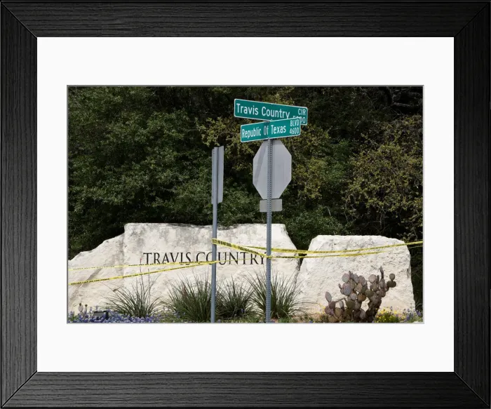 Framed Print : Police lines are seen blocking off part of Republic of Texas Boulevard following an