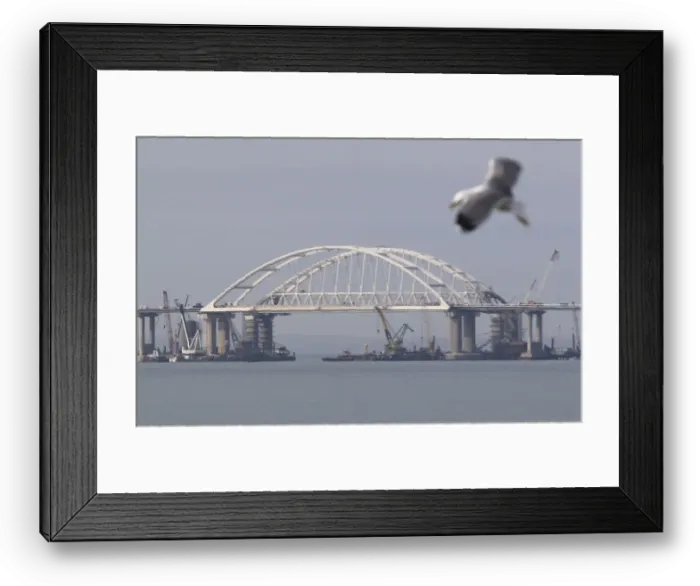 Framed Print : A general view shows a road-and-rail bridge, which is constructed to connect the Russian Framed Print : A general view shows a road-and-rail bridge, which is constructed to connect the Russian