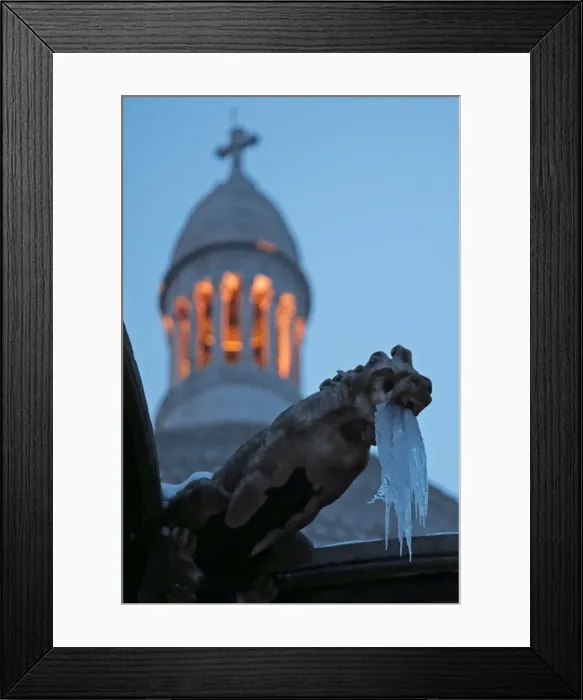 Framed Print : Icicles hang from a gargoyle on the Sacre Coeur basilica at the Butte Montmartre in Paris Framed Print : Icicles hang from a gargoyle on the Sacre Coeur basilica at the Butte Montmartre in Paris