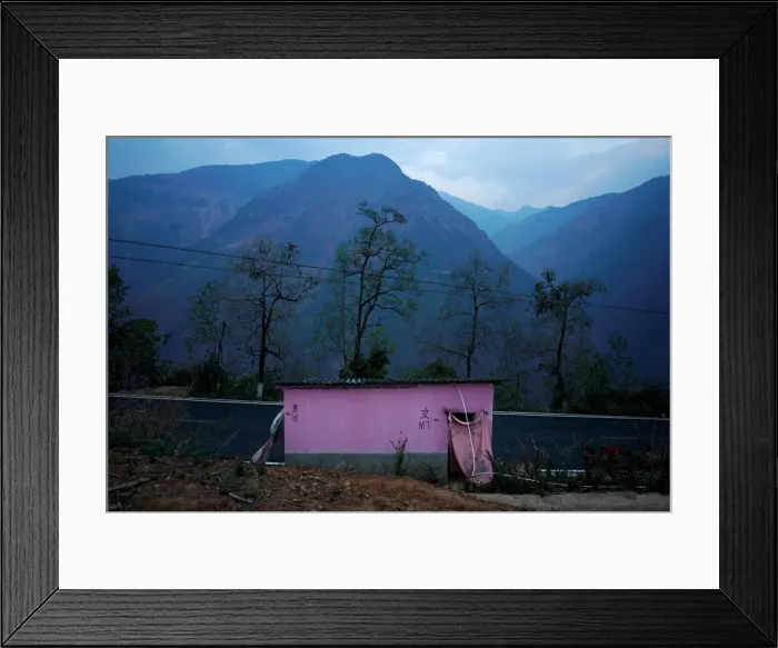 Framed Print : A public toilet is seen at a village of Nujiang Lisu Autonomous Prefecture in Yunnan