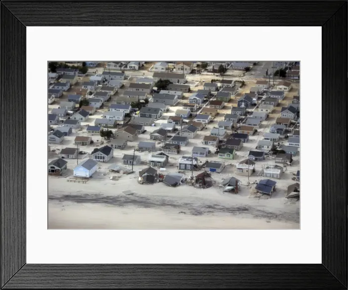 Framed Print : An aerial view of the damage around Atlantic City, New Jersey is seen in the aftermath of