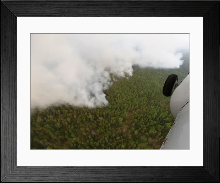 Framed Print : An aerial view shows the Taiga wood burning near Boguchany Framed Print : An aerial view shows the Taiga wood burning near Boguchany