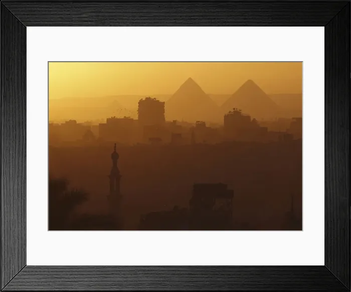 Framed Print : A general view of mosques and the great pyramids before sunset in Cairo Framed Print : A general view of mosques and the great pyramids before sunset in Cairo