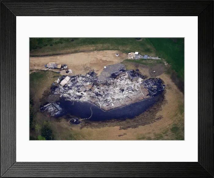Framed Print : An aerial view of ashes and debris of a house burned down by a wild fire in Slave Lake Framed Print : An aerial view of ashes and debris of a house burned down by a wild fire in Slave Lake