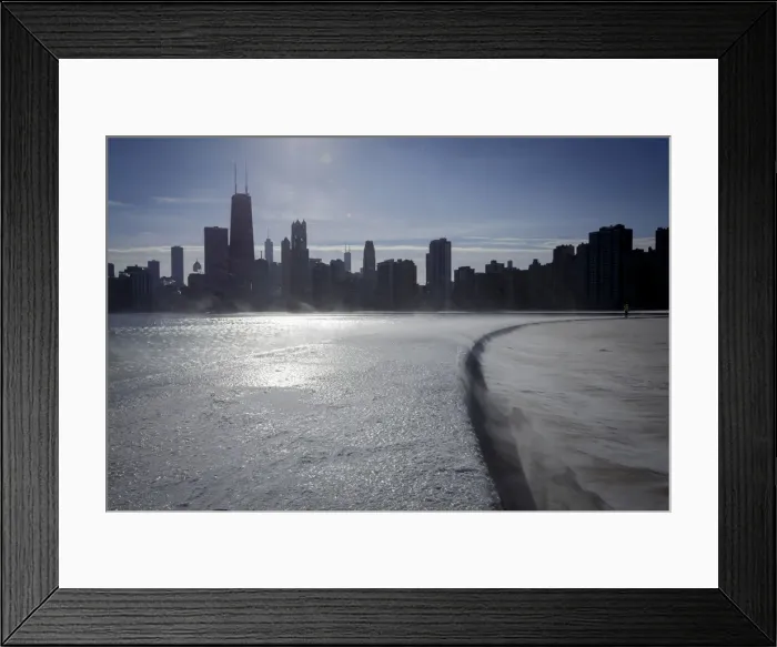 Framed Print : Ice covers the shore of Lake Michigan in Chicago where temperatures have dropped well Framed Print : Ice covers the shore of Lake Michigan in Chicago where temperatures have dropped well