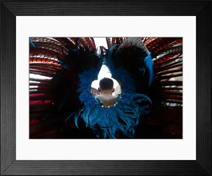 Framed Print : A man marches in the Gay Pride Parade in New York Framed Print : A man marches in the Gay Pride Parade in New York