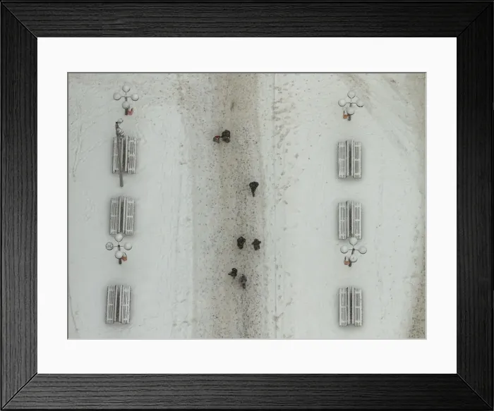 Framed Print : People walk across snow covered street in Berlin
