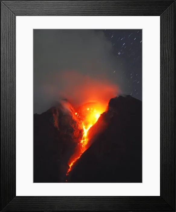 Framed Print : Mount Merapi volcano spews lava and smoke as it erupted again on Wednesday as seen Framed Print : Mount Merapi volcano spews lava and smoke as it erupted again on Wednesday as seen