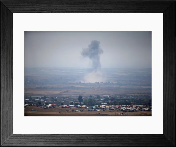 Framed Print : Smoke following an explosion in Syria is seen from the Israeli-occupied Golan Heights Framed Print : Smoke following an explosion in Syria is seen from the Israeli-occupied Golan Heights