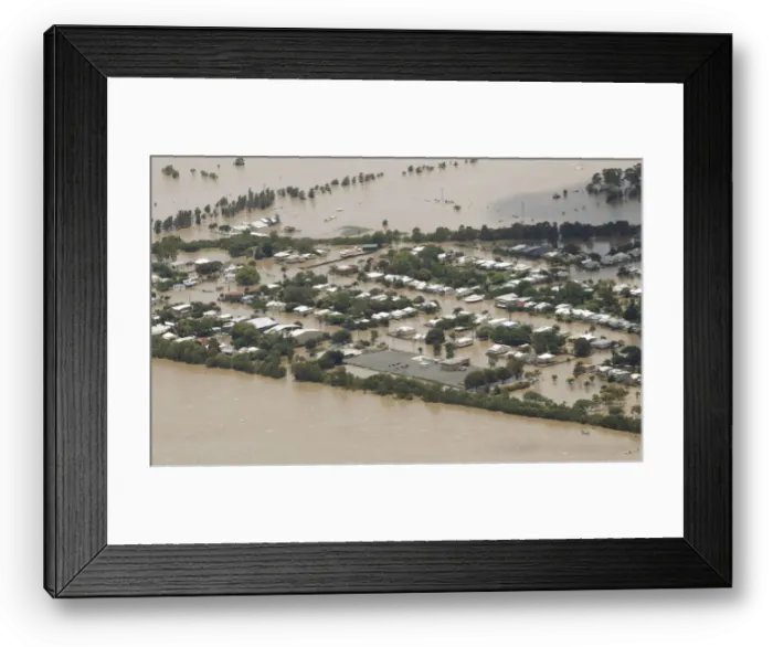 Framed Print : An aerial view of partially submerged houses in flooded Rockhampton in Australias state
