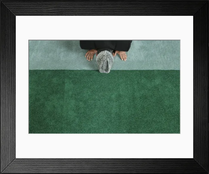Framed Print : A man prays at the Baitul Futuh Mosque in London Framed Print : A man prays at the Baitul Futuh Mosque in London