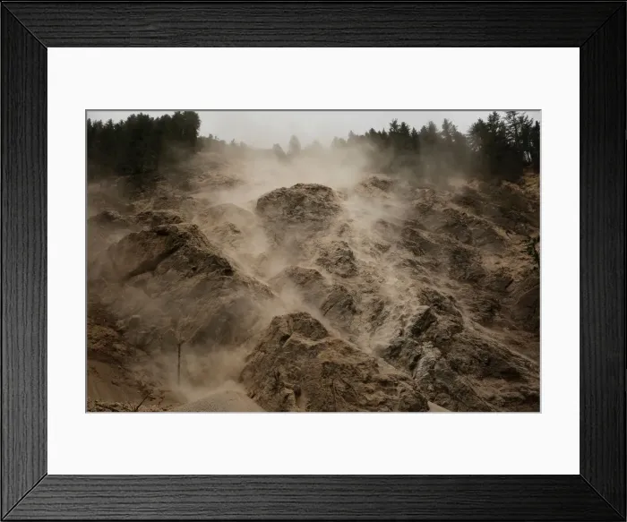 Framed Print : Debris rolls down the rockface of a mountain after an earthquake outside Jiuzhaigou Framed Print : Debris rolls down the rockface of a mountain after an earthquake outside Jiuzhaigou