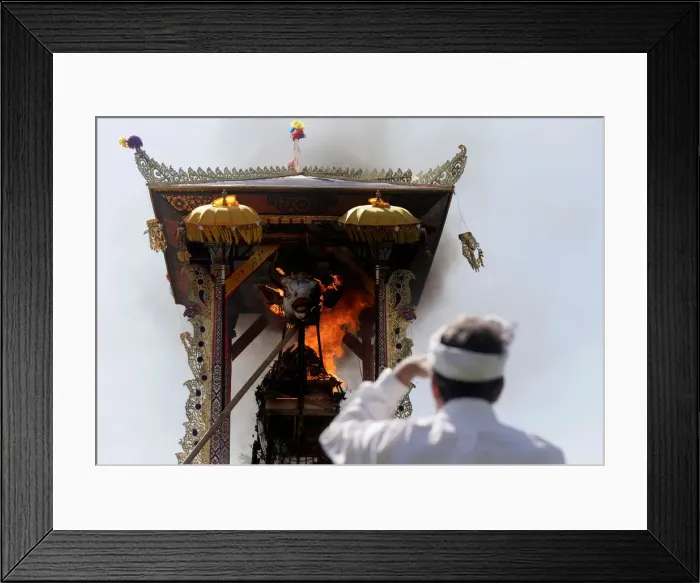 Framed Print : A Balinese man watches the cremation of Ida Anak Agung Ayu Oka Pemecutan Framed Print : A Balinese man watches the cremation of Ida Anak Agung Ayu Oka Pemecutan