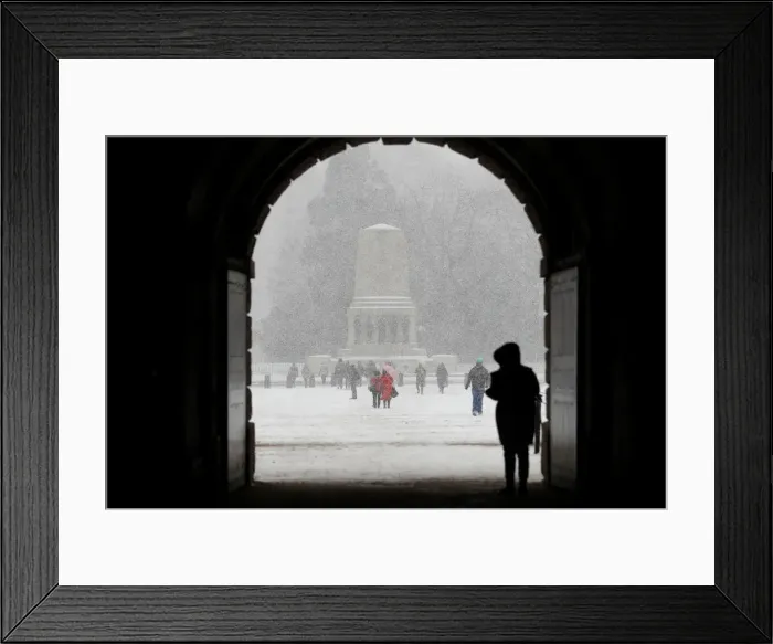 Framed Print : People walk in the snow on Horse Guards Parade in London Framed Print : People walk in the snow on Horse Guards Parade in London