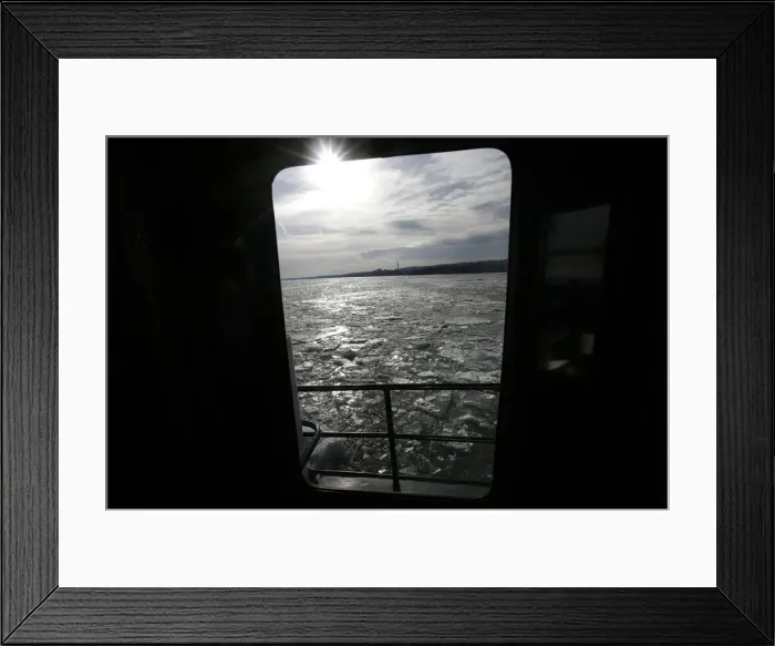 Framed Print : Ice is seen on the Hudson River through a window of the U. S Framed Print : Ice is seen on the Hudson River through a window of the U. S