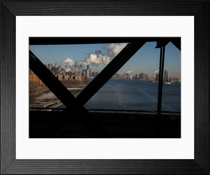 Framed Print : Steam from buildings lingers due to extreme cold in New York