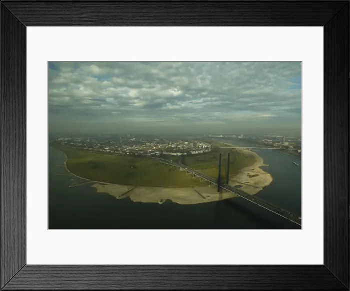 Framed Print : A suburb of Duesseldorf with the Rhine rivers partially dried-up riverbed