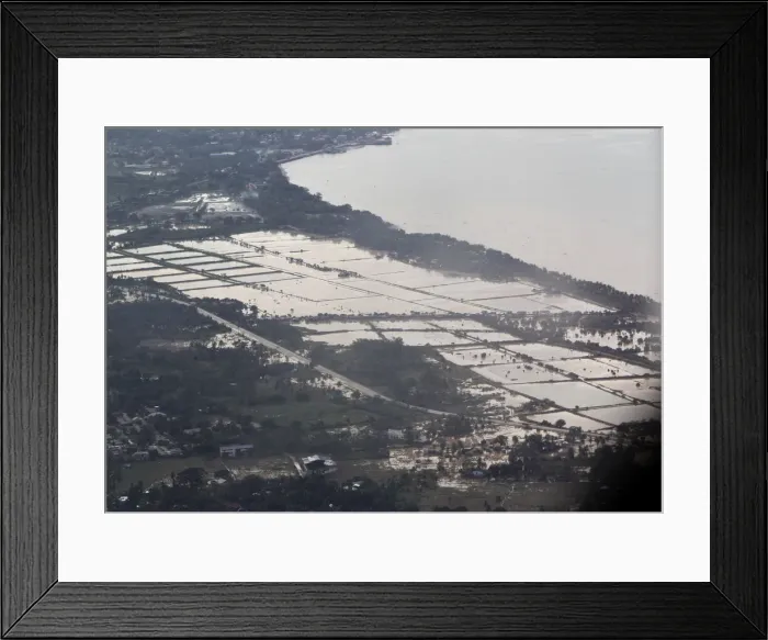 Framed Print : An aerial view shows villages inundated in floodwaters caused by typhoon Washi in Cagayan