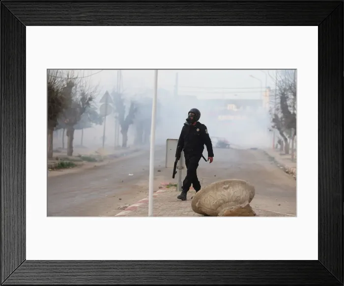 Framed Print : Riot police clash with protesters during demonstrations against rising prices Framed Print : Riot police clash with protesters during demonstrations against rising prices