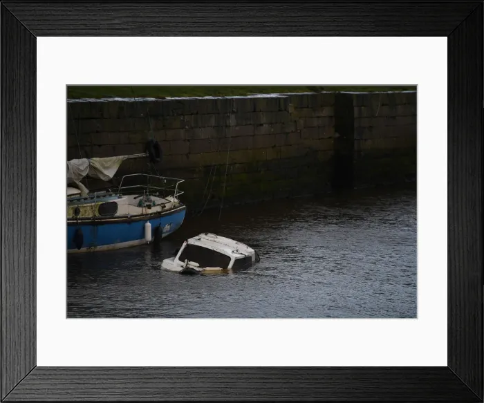 Framed Print : A sunken boat is seen half submerged after Storm Eleanor in Galway Bay Framed Print : A sunken boat is seen half submerged after Storm Eleanor in Galway Bay