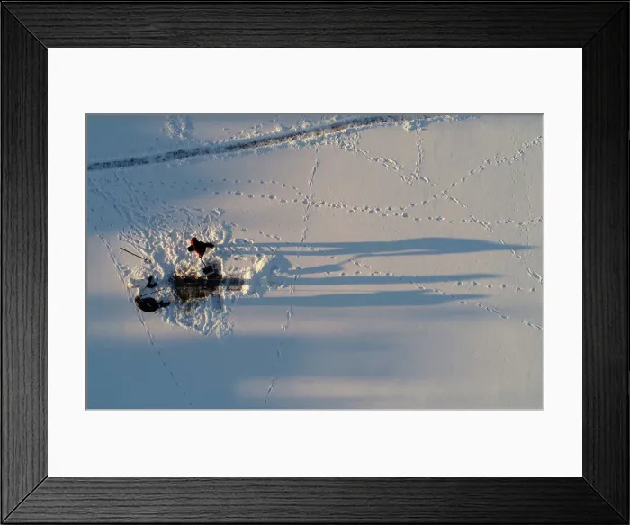 Framed Print : An aerial view shows men making a cross-shaped ice hole on the frozen Yenisei River Framed Print : An aerial view shows men making a cross-shaped ice hole on the frozen Yenisei River