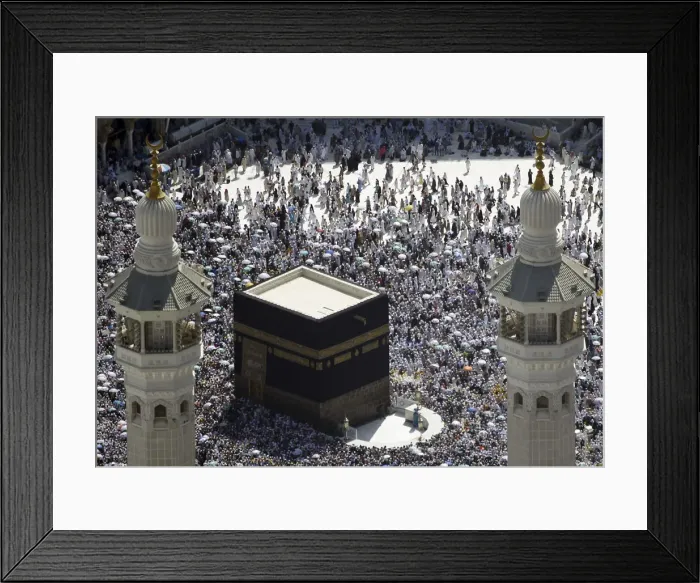 Framed Print : Muslim pilgrims circle the Kaaba and pray at the Grand Mosque on the second day of Eid Framed Print : Muslim pilgrims circle the Kaaba and pray at the Grand Mosque on the second day of Eid