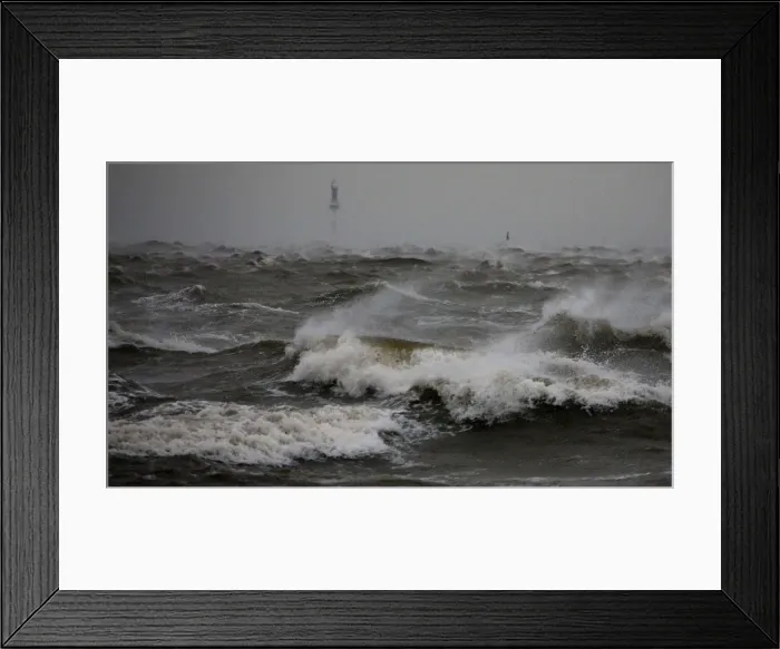 Framed Print : Waves at the North Sea are pictured at a quay wall in Cuxhaven Framed Print : Waves at the North Sea are pictured at a quay wall in Cuxhaven