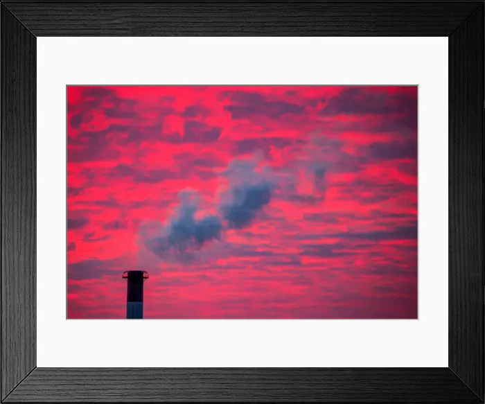 Framed Print : Steam rises from a smoke stack at sunset in Lansing, Michigan Framed Print : Steam rises from a smoke stack at sunset in Lansing, Michigan