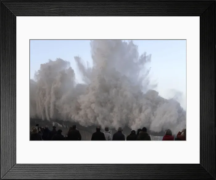 Framed Print : People look and take pictures of giant waves in the port town of Llanes Framed Print : People look and take pictures of giant waves in the port town of Llanes