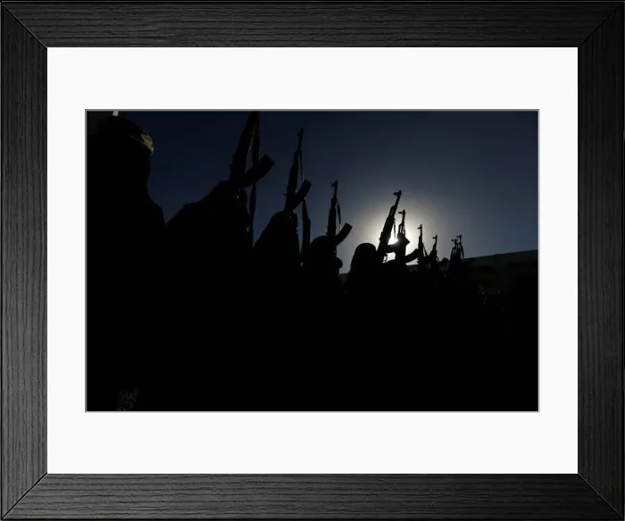 Framed Print : Women loyal to the Houthi movement hold up rifles as they attend a gathering to show Framed Print : Women loyal to the Houthi movement hold up rifles as they attend a gathering to show