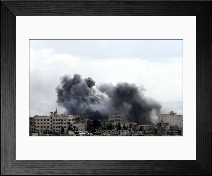 Framed Print : Smoke rises from the besieged Eastern Ghouta in Damascus Framed Print : Smoke rises from the besieged Eastern Ghouta in Damascus