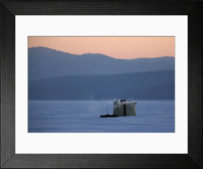 Framed Print : A tent of fishermen is seen on the ice-covered Yenisei River during sunset in Framed Print : A tent of fishermen is seen on the ice-covered Yenisei River during sunset in