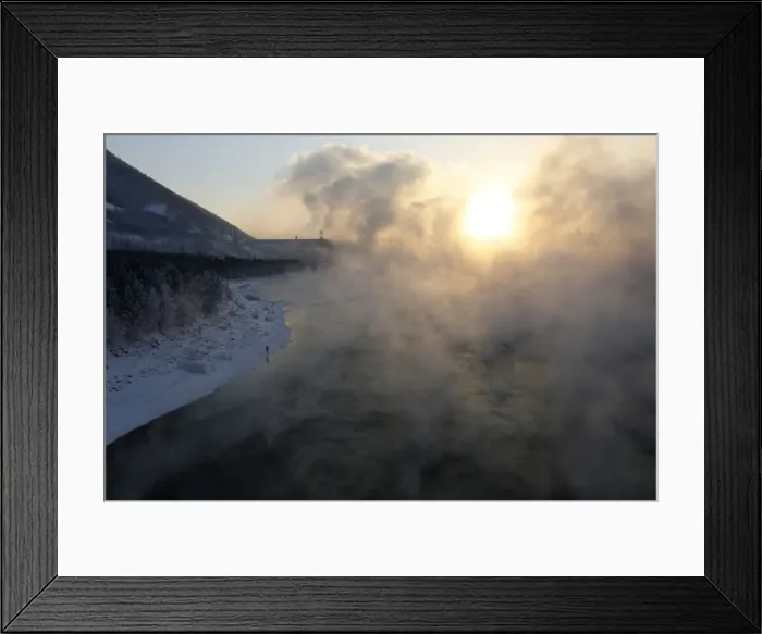 Framed Print : A fisherman is seen on a bank of the Yenisei River at sunset near the Krasnoyarsk hydro Framed Print : A fisherman is seen on a bank of the Yenisei River at sunset near the Krasnoyarsk hydro