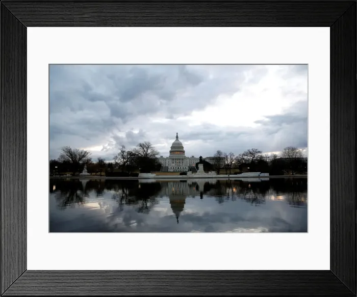 Framed Print : Clouds pass over the U. S. Capitol at the start of the third day of a shut down of