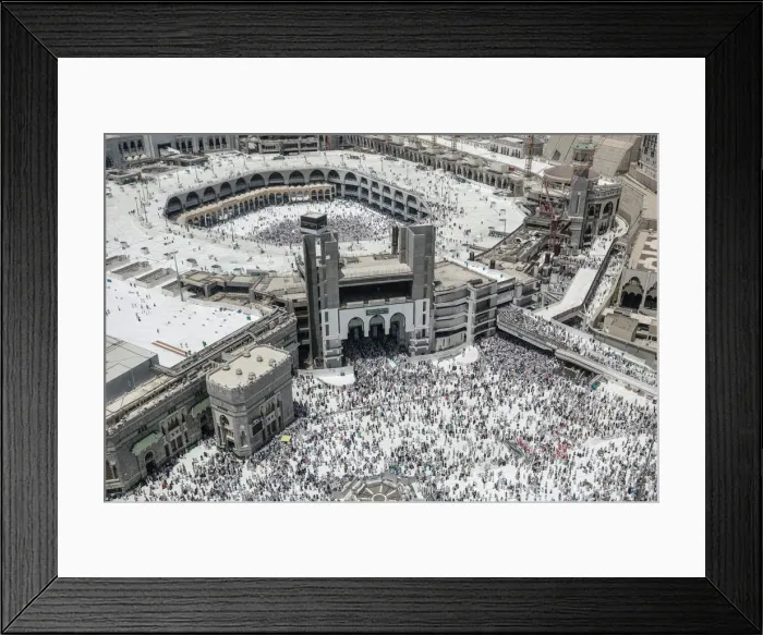 Framed Print : Muslim pilgrims walk out after the Friday prayer at the Grand mosque ahead of annual Haj Framed Print : Muslim pilgrims walk out after the Friday prayer at the Grand mosque ahead of annual Haj