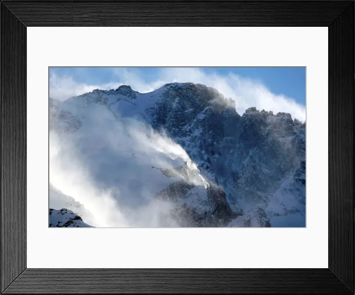 Framed Print : The snow sails to the top of a snowy mountain in Saint-Pancrace as winter weather Framed Print : The snow sails to the top of a snowy mountain in Saint-Pancrace as winter weather