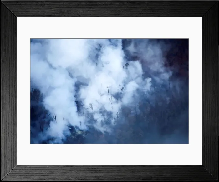 Framed Print : Smoke and steam rise from fissures near the Leilani Estates subdivision during ongoing