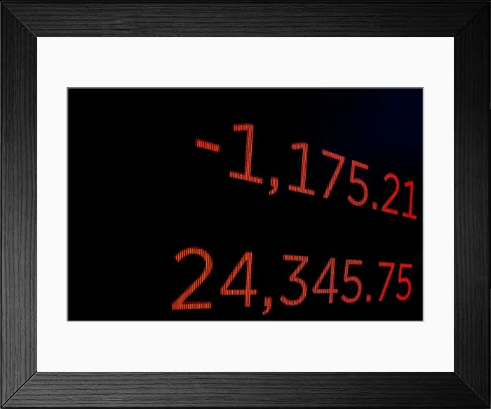 Framed Print : A screen displays the Dow Jones Industrial Average following the closing bell on Framed Print : A screen displays the Dow Jones Industrial Average following the closing bell on