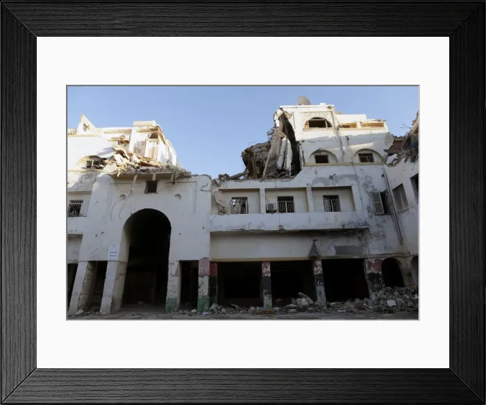 Framed Print : Historic building, that was ruined during a three-year conflict, is seen in Benghazi Framed Print : Historic building, that was ruined during a three-year conflict, is seen in Benghazi