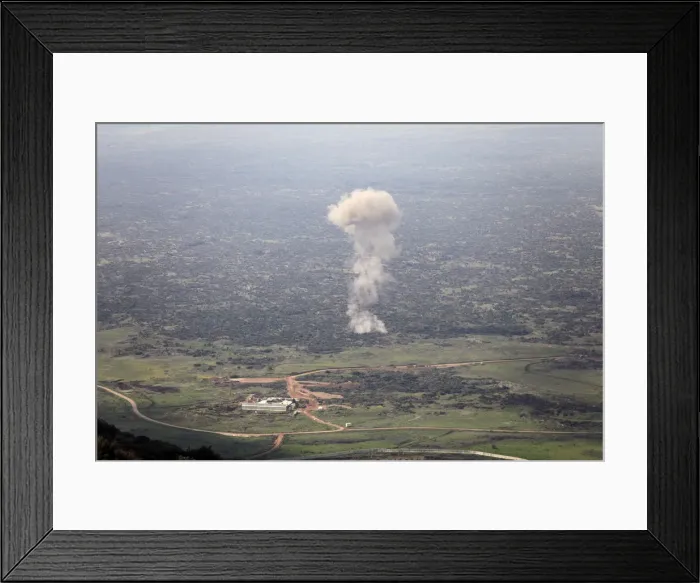 Framed Print : Smoke rises outside Rajo Framed Print : Smoke rises outside Rajo
