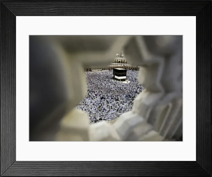 Framed Print : Muslim pilgrims circle the Kaaba and pray at the Grand mosque during the annual haj