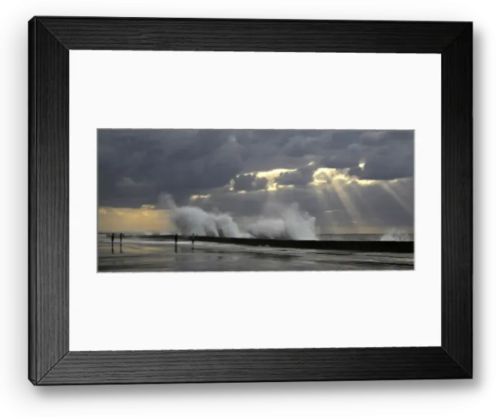 Framed Print : People walk as waves crash on the El Malecon seafront boulevard Framed Print : People walk as waves crash on the El Malecon seafront boulevard