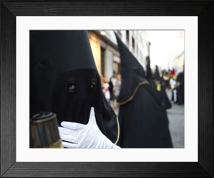 Framed Print : A penitent waits for the start of a procession in Tenerife in Spains Canary Islands Framed Print : A penitent waits for the start of a procession in Tenerife in Spains Canary Islands