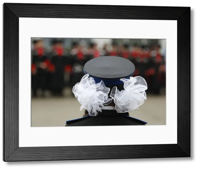 Framed Print : A schoolgirl stands at attention as she takes part in activities of a Cossack club in Framed Print : A schoolgirl stands at attention as she takes part in activities of a Cossack club in